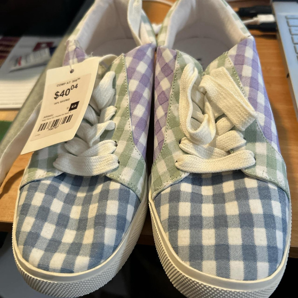 Katy Perry sneakers 
New with tags
Multi color with white stripes 
Size 6